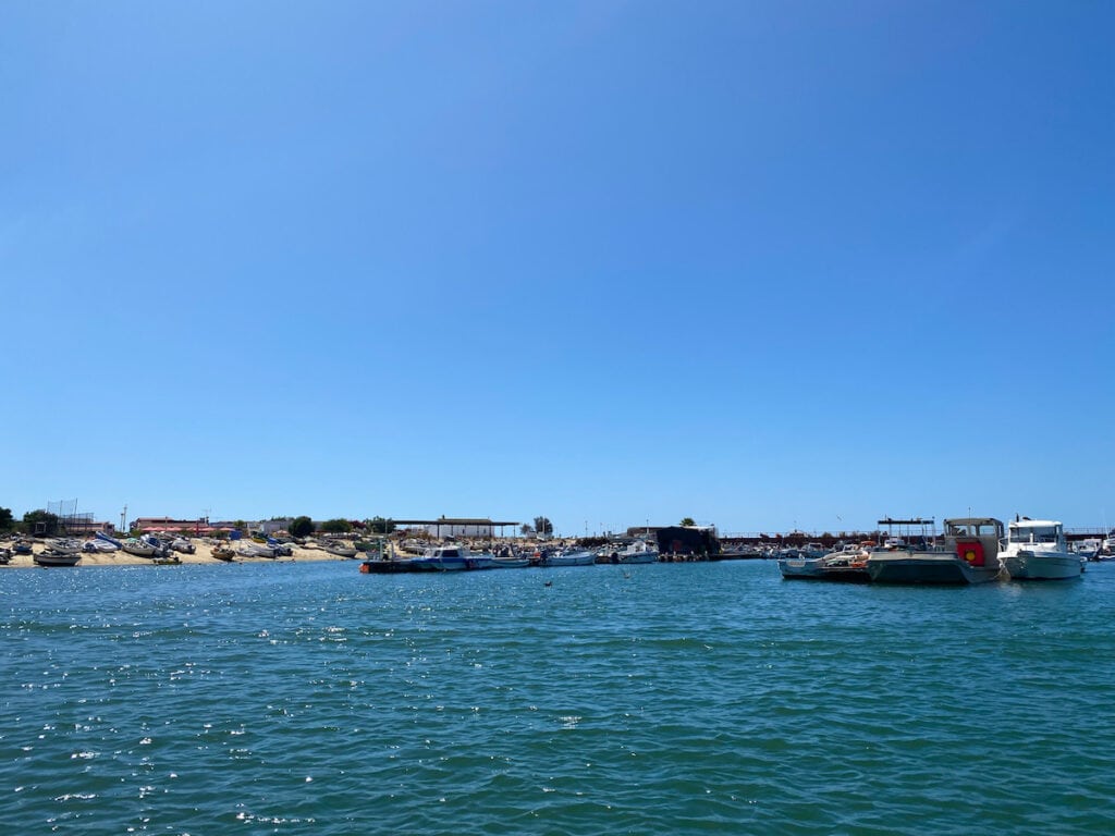 The fishing village Ilha Culatra from the ocean side, which. you can visit on one of the Olhão boat trips