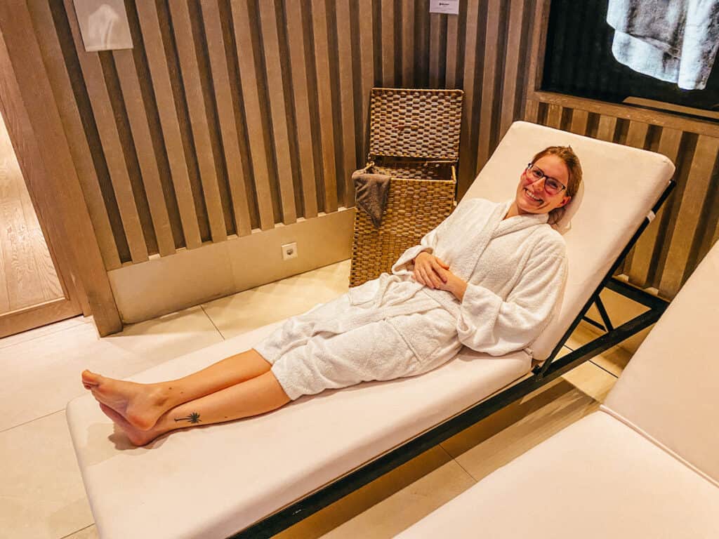 Tina on a sun lounge in the spa area of a hotel in Barcelona