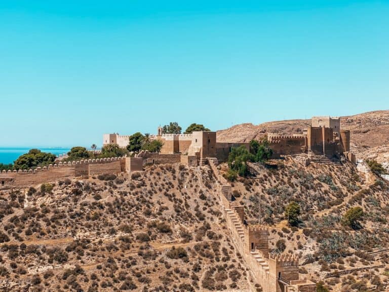 The Alcazaba of Almeria, a historic fortress overlooking the arid landscape and Mediterranean Sea, showcasing the rich cultural heritage of the region. Is Almeria worth visiting? Definitely, for this stunning landmark alone.