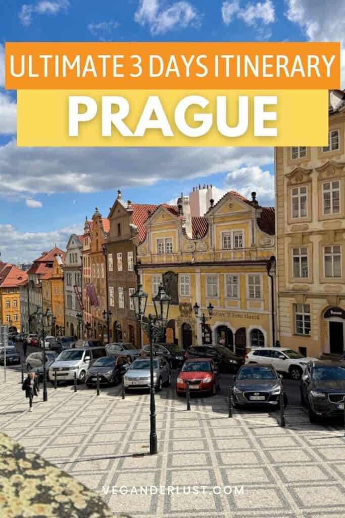 Colorful historic buildings with ornate facades line a cobblestone street in Prague under a blue sky with fluffy clouds; parked cars and a few pedestrians fill the foreground. Text overlay reads “Ultimate 3 Days Itinerary Prague” and “veganderlust.com”.